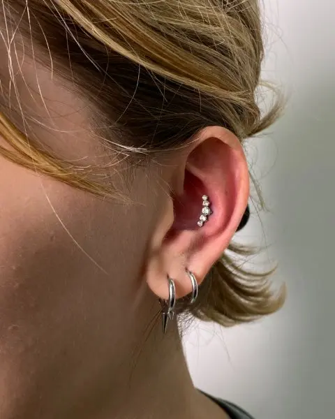 conch piercing athens