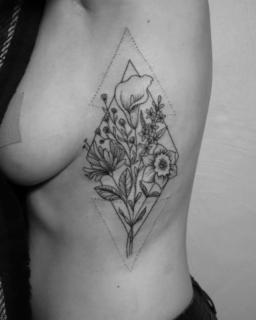 ribs tattoo flowers