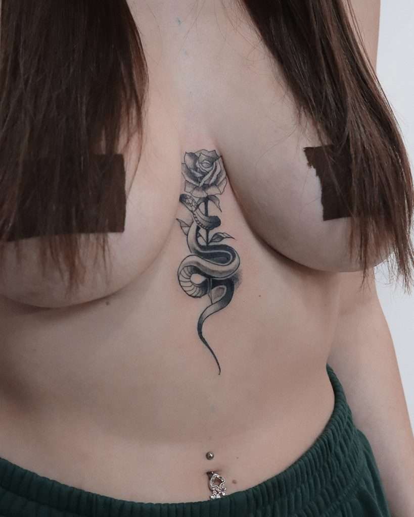 rose underboob tattoo